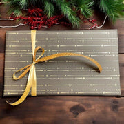 Geschenkpapier B 50 cm. Schwarz mit Sternschnuppen. 100 m *