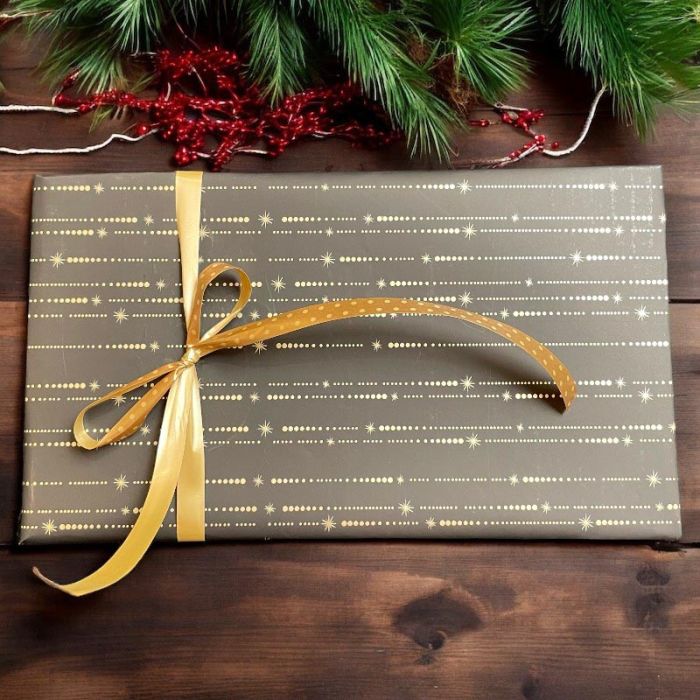 Geschenkpapier B 50 cm. Schwarz mit Sternschnuppen. 100 m *