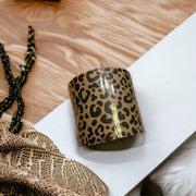 Geschenkpapier B 10 cm. Jaguar-Print, Kraftpapier. 100 mtr.