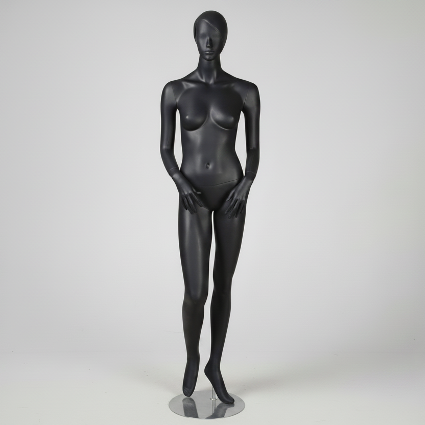 Weibliche Schaufensterpuppe, Größe 1400. Grau, matt, mit Kopf, Gesicht und modelliertem Haar. Höhe 178 cm. Hände nach vorn gerichtet.