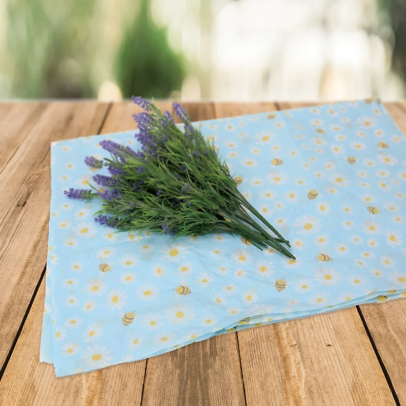 Detalje af silkepapir med bier og blomster