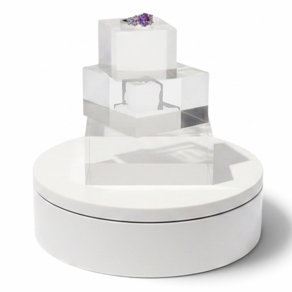 SuperSellerS white electronic rotating display stand with clear acrylic risers showcasing a ring